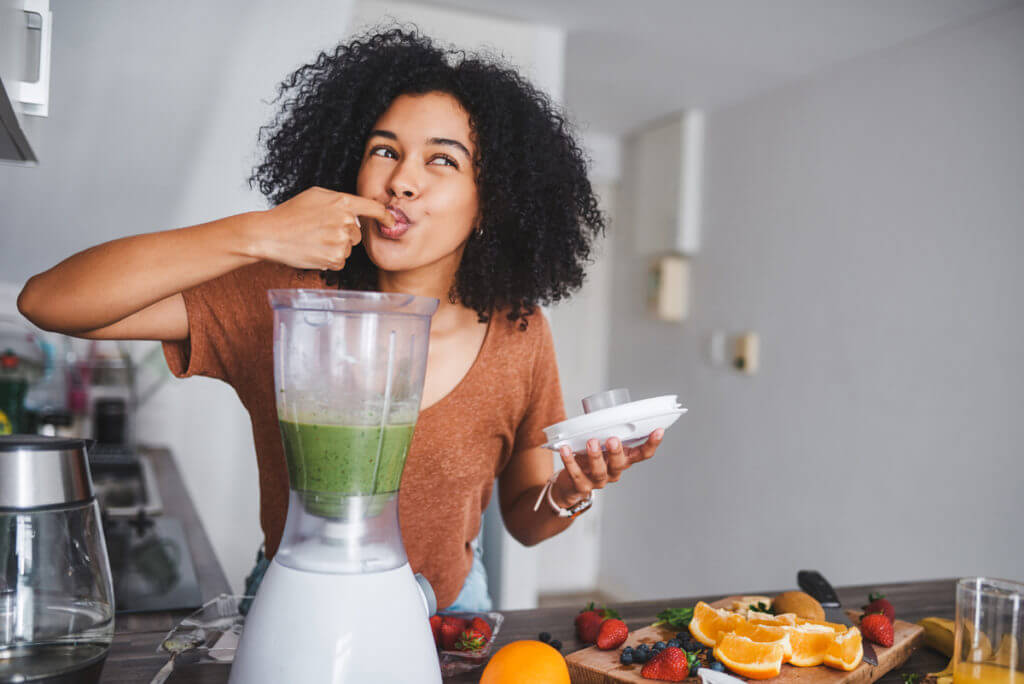 Woman eating a healthy smoothie