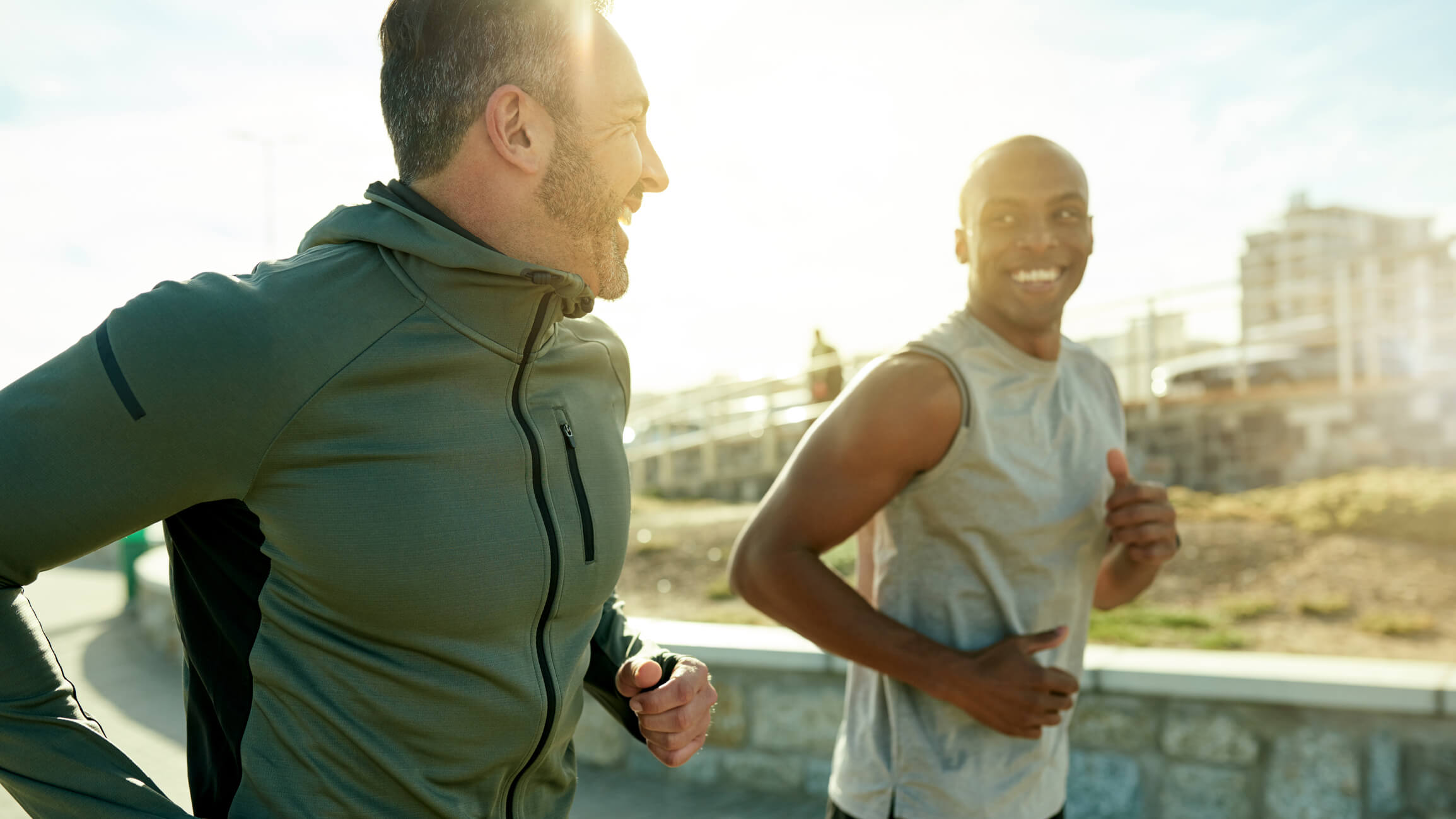 Two men running outside